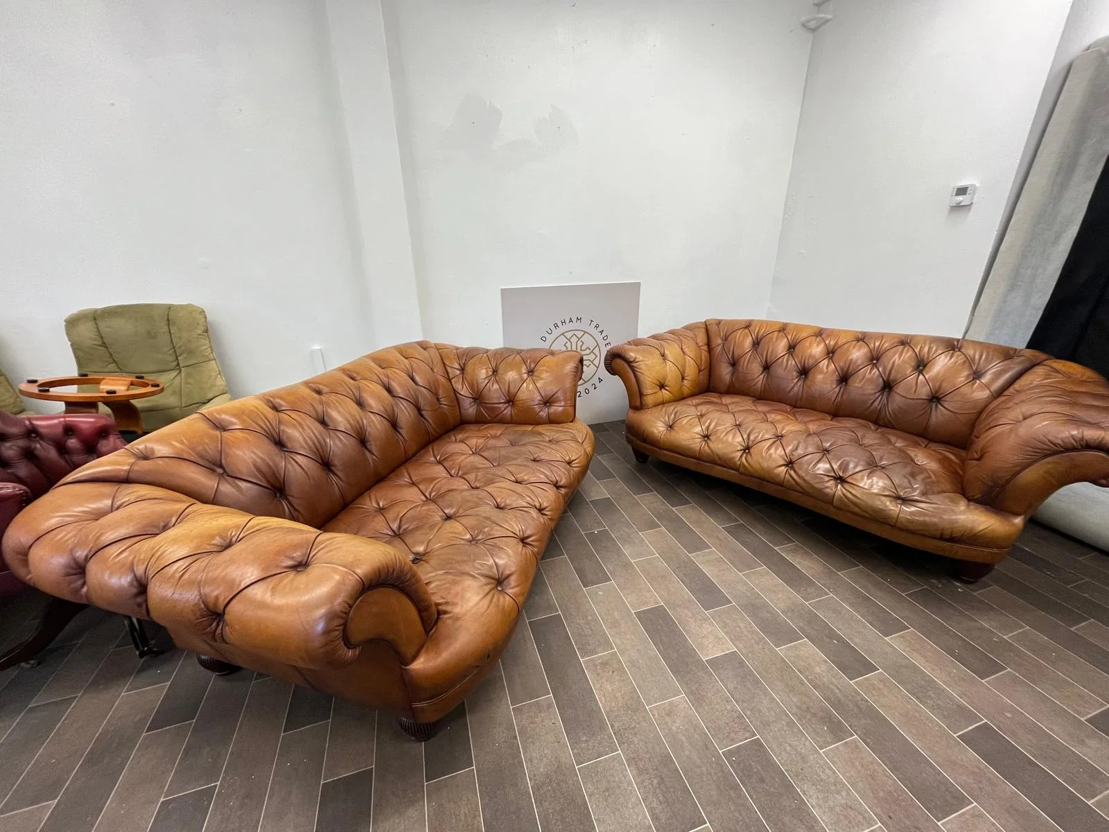 Large leather suite requiring careful handling